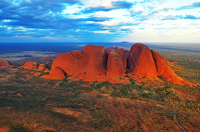 Kata Tjuta from the side, showing the eroded rocks and vibrant oranges of this structure