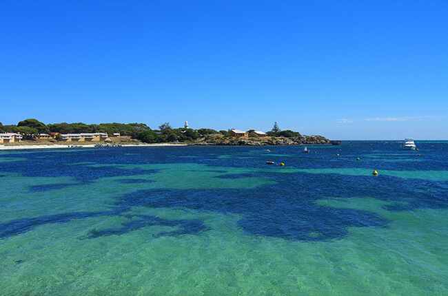 Coast of Rottnest Island, Australia, with varying green and blue water